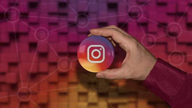 hand holding instagram logo 284880 140