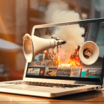 laptop computer with loudspeaker urban background with megaphone 993599 6916